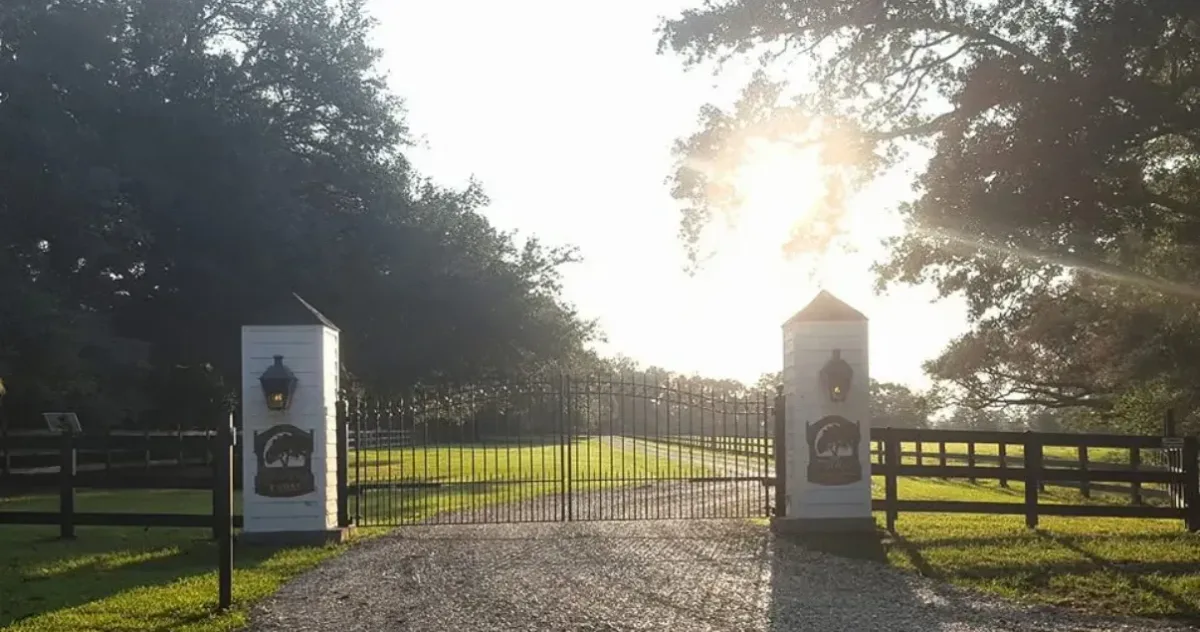 Custom driveway gate and brick columns built by W2 Commercial Construction