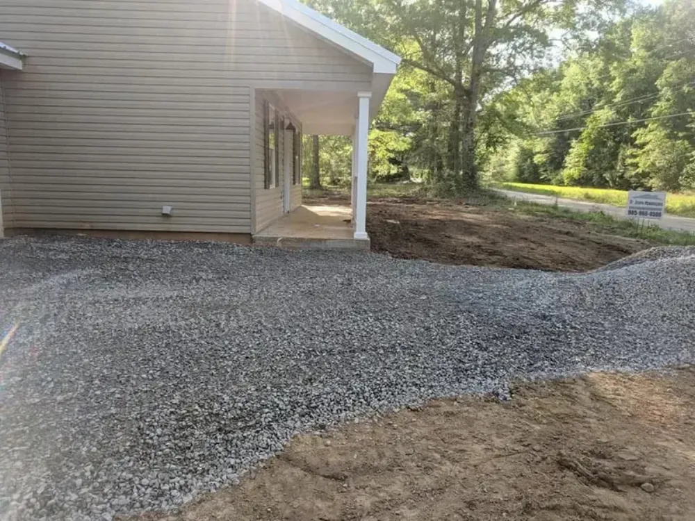 Compacted sub-base formed and prepped before a concrete pour in Covington, LA