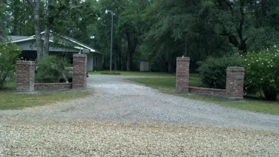 Finished driveway with brick entry columns